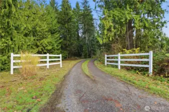 A long private drive leads you home… Beautifully tucked away for exceptional, peace, and privacy.