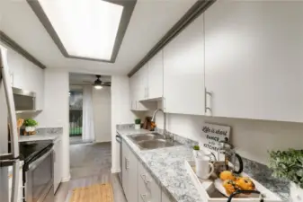 There is plenty of counter space for creating wonderful meals plus updated stainless steel appliances & sink/faucet