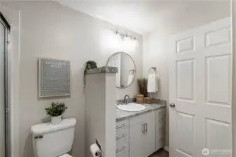 Nice doors & trim are featured throughout the home. This door leads to the hallway so the bath can be accessed two ways