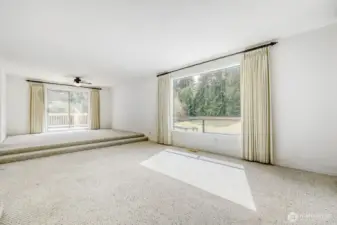 Sunken Living room with dining area