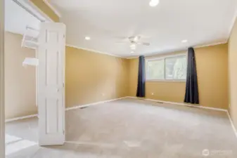 primary bedroom with walk in closet