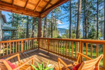 Sun filled covered deck located off of the main floor living area. Views to the south.