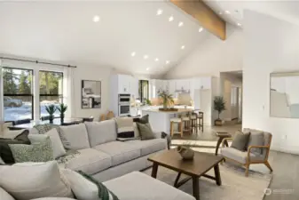 Bright, open, and inviting living room, kitchen & dining.