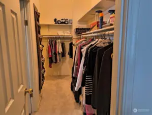 Impressive primary closet! Accessed from the bedroom AND the bathroom