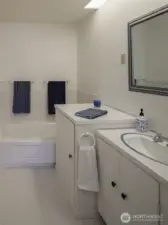 Main bathroom with tub.