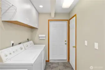 You laundry connects the kitchen to the garage.  Great space to get out of those dirty clothes after working outside.