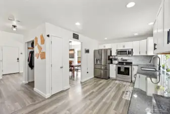 Recessed lighting in open concept Kitchen.