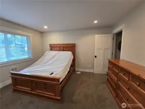 Detached ADU Bedroom with laundry room attached