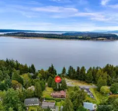 The street directly across the home connects directly to the clubhouse and boat launch.