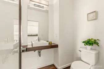 Downstairs powder room for convenience.