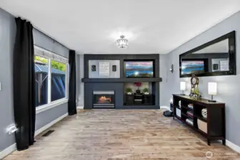 Family room space looking with cozy gas fireplace