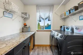 Upstairs laundry room means no trecking your laundry hampers up and down the stairs from bedrooms.