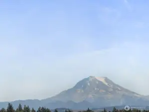 A close-up of the stunning Mt Rainier view from the laundry room.