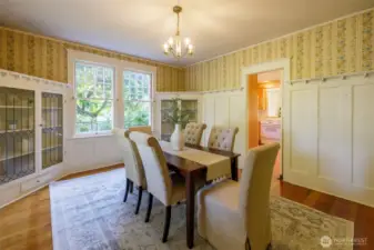Elegant formal dining room - so much room for gathering loved ones around and hosting a true dinner extravaganza.