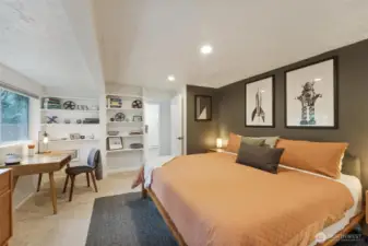 The bedroom is spacious and bright.