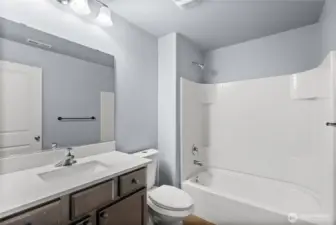 Full bath just off the mail level bedroom!