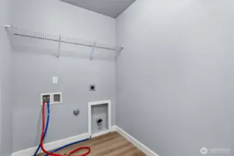 Upstairs laundry room, so convenient