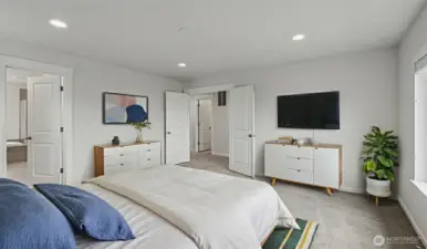 Primary bedroom with french doors.