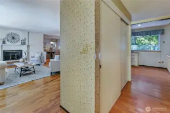 Open entryway to either the daylit living room or to the upper or lower stairs.