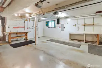 Shelving, worktops, and ample storage space in the garage.