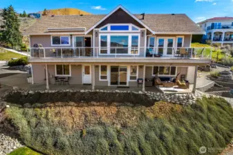 Welcome to 201 Stehekin Way! This 2,864 sq ft Lake Chelan home features generous indoor and outdoor spaces, including a view deck and covered lower patio for year-round enjoyment.