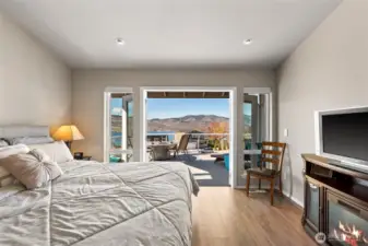 How about a room with a view? Take in beautiful Lake Chelan and mountain scenery right from inside your primary suite which easily accommodates a king bed.