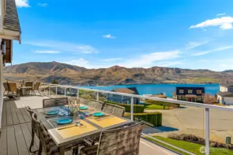 Outdoor dining with Lake Chelan views—set next to a plumbed propane BBQ and just steps from the kitchen.