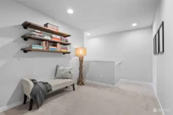 Upstairs is a bonus area for reading nook, office, yoga space...the possibilities are endless.