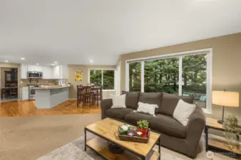 Family Room with Large Window and Woodburning Fireplace