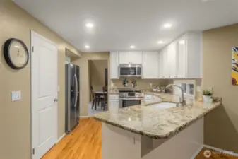 Spacious Kitchen with Pantry, Stainless Steel Appliances and Granite Countertops