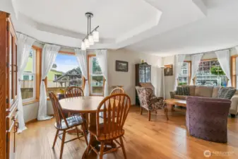 Tray Ceiling, Wood Wrapped Bay Windows, & Updated Light Fixture Highlight the Dedicated Dining Area!