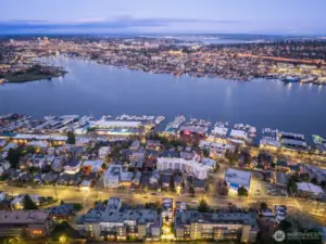 A broader lake panorama shows marinas, houseboats, and Tech Row—offering an at-a-glance reminder of why you chose Dexter. Photos are of model home 2009B.
