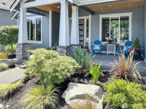 Charming covered front porch greets visitors and is the perfect place to relax.