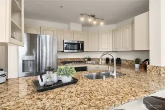 Kitchen with updated appliances.