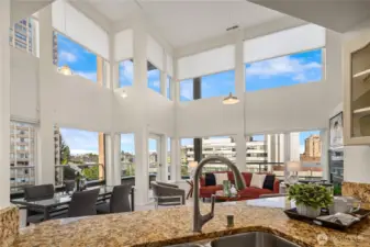 Open concept kitchen looks out to the living room and dining room area which makes great for entertaining