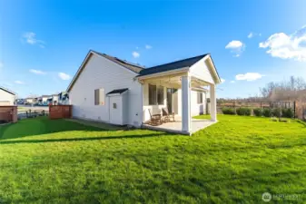 Huge fully fenced yard is perfect for fun, games and furry friends.