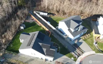 Fully owned solar system is maxed out to accommodate a future electric vehicle. The system currently provides enough power to cover nearly all of the bills years round.