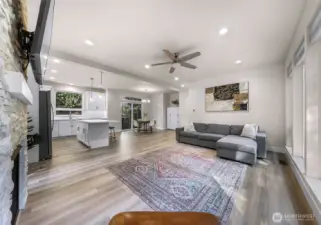 Additional angle of living room highlighting open floor plan and natural light.