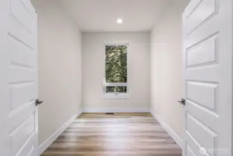 Bright office/flex room with double doors, ideal for home office, guest space, or hobby room