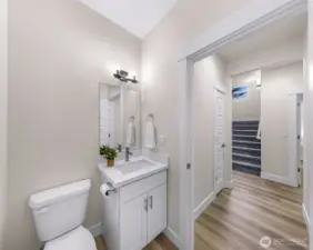 Half bathroom for guests off the main living space.