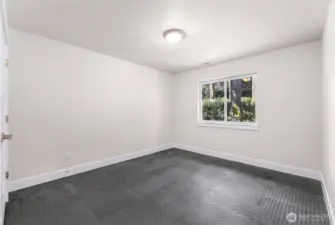 Third bedroom has been converted to a workout room.