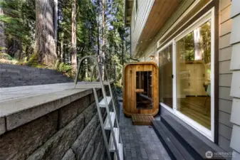 Exterior patio area with sauna and access to lower level