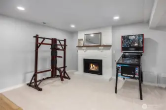 The painted brick fireplace could anchor a second seating space.