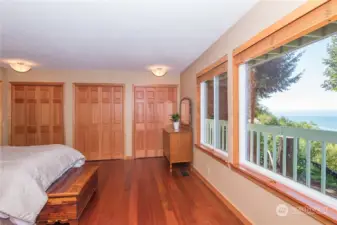 Make that 3 bifold closets and sweeping views with and decking from one side of the home to the other. Beautiful Wood floors with VG Fir Doors and VG Fir Baseboards