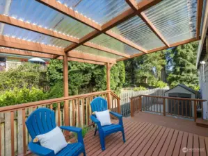 Beautiful covered deck. Two sheds in fully fenced back yard.