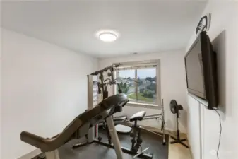 Third bedroom is turned into nice exercise room.