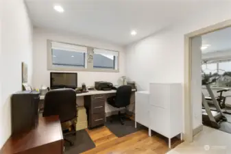 Built in office upstairs with hardwood flooring adds convenience for work or hobbies.