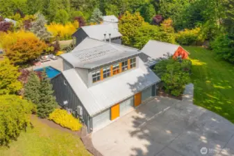 3 car garage with lots of extra parking in front of the garage.