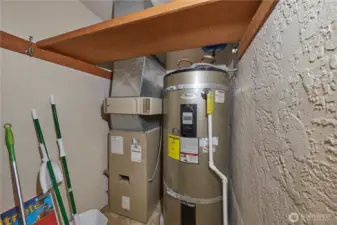 Water heater and furnace in the utility closet