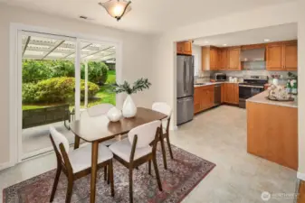 Eating space off the kitchen, right near the slider to the large back covered patio.